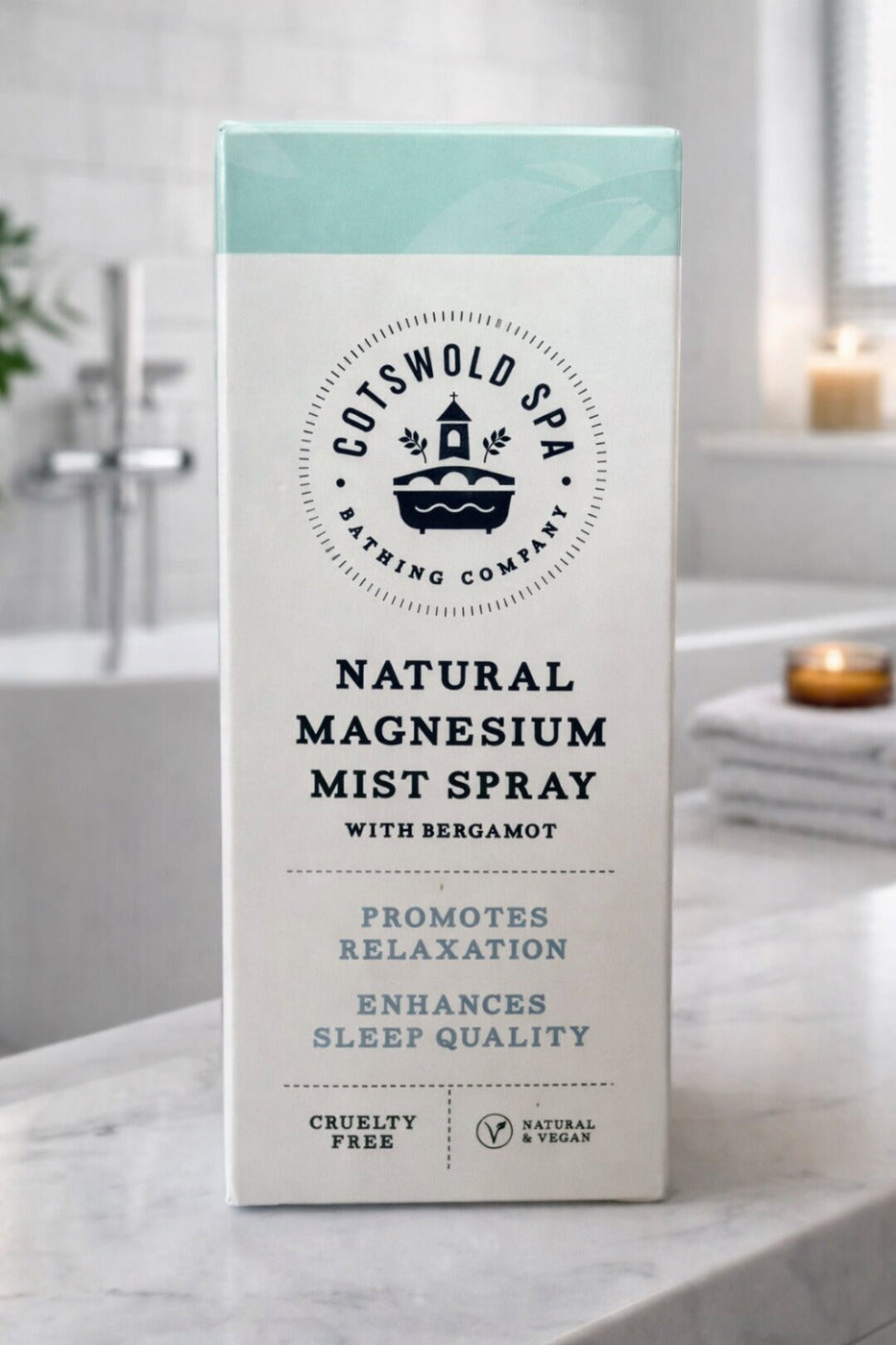 Cotswold Spa Natural Magnesium Mist Spray packaging on a bathroom counter.