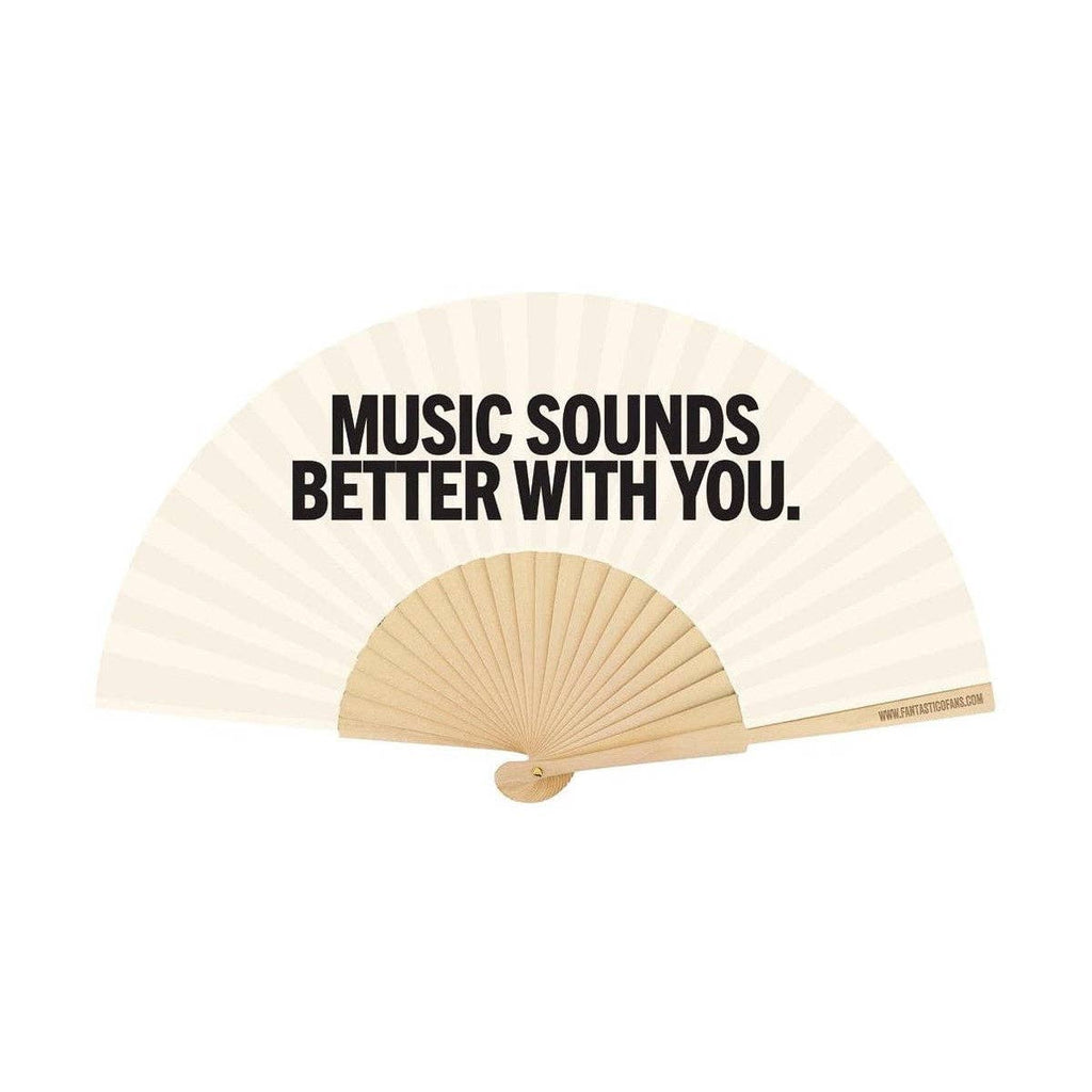 Handheld fan with 'Music sounds better with you' text on a white background